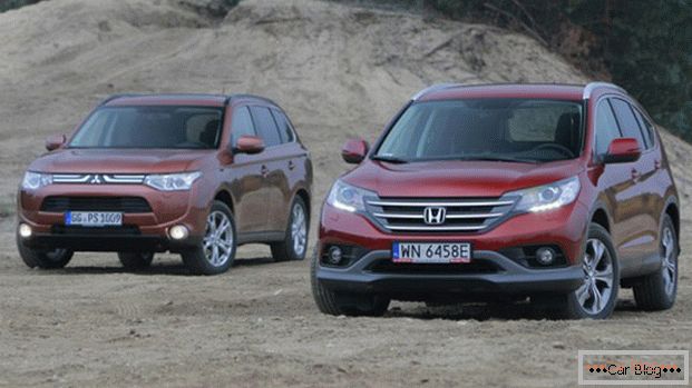 Mitsubishi Outlander і Honda CR-V - автомобили,  которые могут похвастаться немалой популярностью среди паркетников